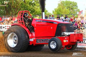bright red tractor at tractor pulling event