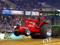 red tractor at tractor pulling event