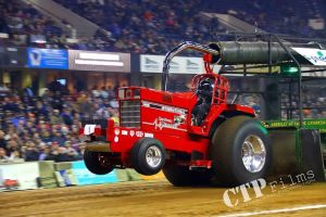 red tractor at tractor pulling event
