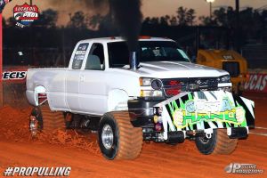 white truck pulling outside white truck pulling outside