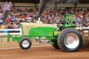 lime green tractor at tractor pulling event lime green tractor at tractor pulling event