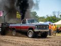 old pulling truck blowing smoke