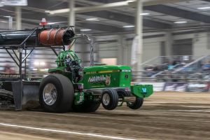 green tractor pulling inside green tractor pulling inside