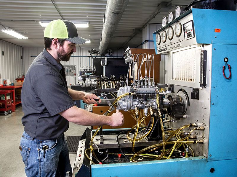 Diesel Performance Shop Team Member Working